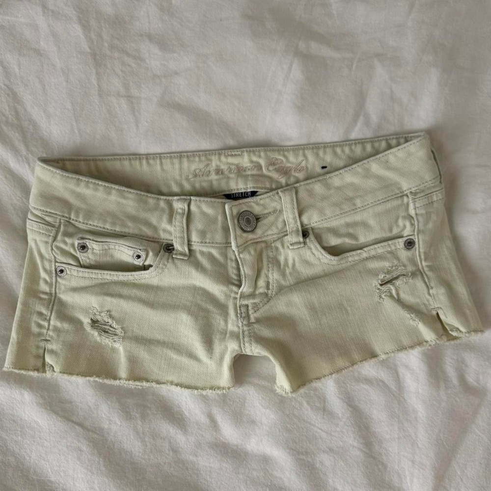 2000s Deadstock American Eagle low-rise pale yellow denim shorts